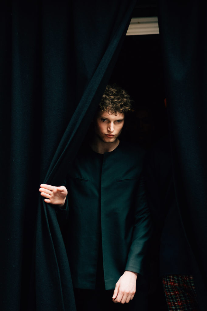 Protagonist Ollie Allen breaches the curtain to descend upon on the runway- Image By Ollie - www.instagram.com/olvr.Jc
